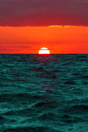 Hot and romantic sunset over the Baltic sea. Calm landscapeの写真素材