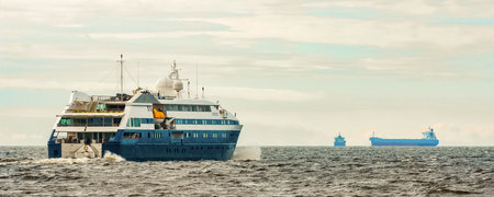 Small blue passenger ship sailing in Baltic sea. Spa servicesの写真素材