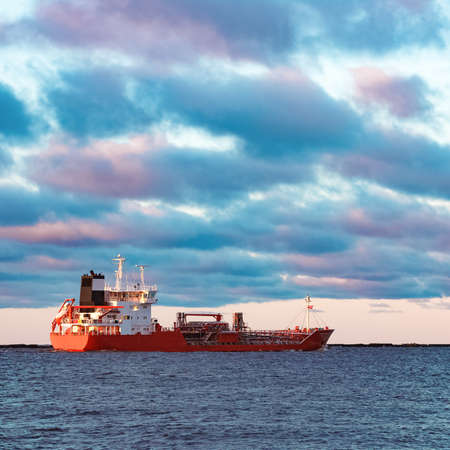 Red cargo oil tanker moving to Baltic seaの写真素材