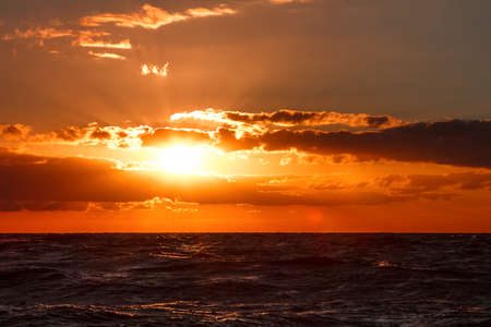 Hot and romantic sunset over the Baltic sea. Calm landscapeの写真素材