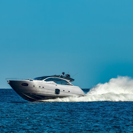 Grey speedboat moving fast by the river in Latvia. Water sportの写真素材