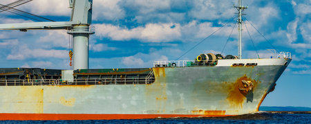 Grey cargo ship. Logistics and merchandise transportationsの写真素材