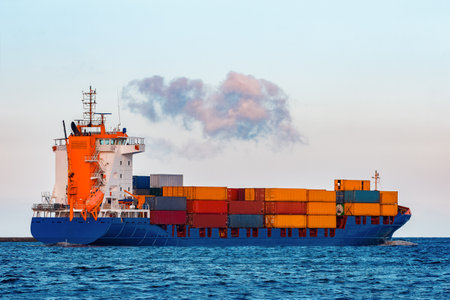 Blue container ship. Global logistics and merchandise transfer
