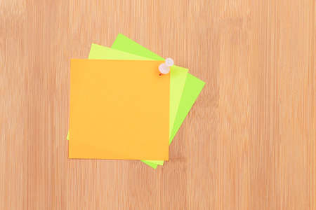 Colored Sticky Notes with Copyspace Pinned to the Wooden Message Board. To Do List Reminder in Office. Blank Memo Sticker at Work - Template. Empty Checklist - Mockupの写真素材