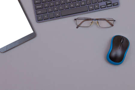 Top View of Workplace. Digital Gadgets Lying on Grey Table - Flat Layの写真素材