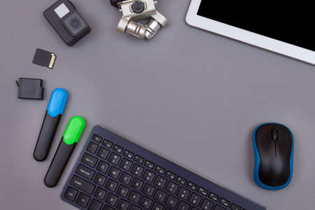 Top View of Video Bloggers Workplace. Digital Gadgets Lying on Grey Table - Flat Layの写真素材