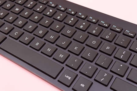 Black Keyboard for Tablet or PC on Pink Backgroundの写真素材