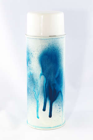 Blue Spray Paint Can on White Background - Close-Up Shotの写真素材