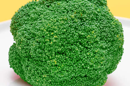 Macro Shot of Fresh and Raw Broccoli - Close-Up. Uncooked Green Cabbage. Vegan and Vegetarian Culture. Raw Food. Healthy Eating and Vegetable Dietの写真素材