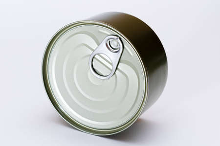Unopened Tin Can with Blank Edge on White Background. Canned Food. Aluminum Can for Safe and Long Term Storage of Food. Steel Sealed Food Storage Containerの写真素材