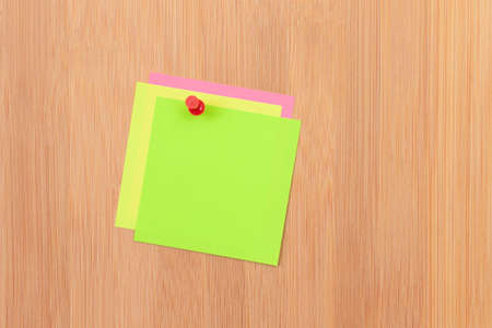 Colored Sticky Notes with Copyspace Pinned to the Wooden Message Board. To Do List Reminder in Office. Blank Memo Sticker at Work - Template. Empty Checklist - Mockupの写真素材