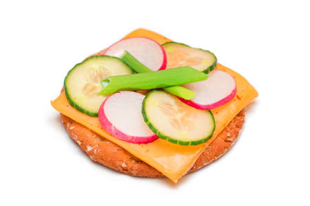 Light Breakfast. Quick and Healthy Sandwich. Fresh Cucumber and Radish with Green Onions and Cheese on Crispy Cracker - Isolated on Whiteの写真素材