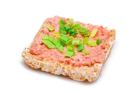 Rice Cake Sandwich with Fish Cream and Green Onions - Isolated on White. Easy Breakfast. Diet Food. Quick and Healthy Sandwiches. Crispbread with Tasty Filling. Healthy Dietary Snack - Isolationの写真素材