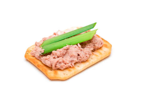Crispy Salted Cracker with Liver Pate and Green Onions - Isolated on White. Easy Snack - Isolationの写真素材
