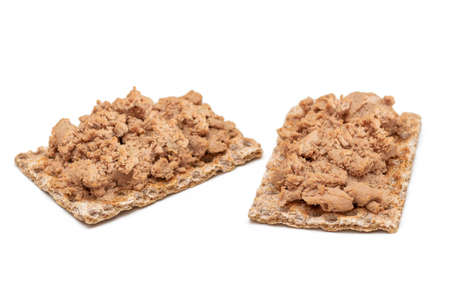 Crispy Sandwich with Chicken Pate Isolated on White Background. Whole Grain Bread with Liver Pate. Diet Breakfast and Healthy Foodの写真素材