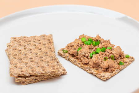 Crispy Sandwich with Chicken Pate and Green Onions on White Plate. Whole Grain Bread with Liver...