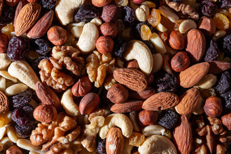 Mixed Nuts: Almonds, Walnuts, Cashews, Peanuts, Hazelnuts, Dried Prunes and Raisins. Different Nut...