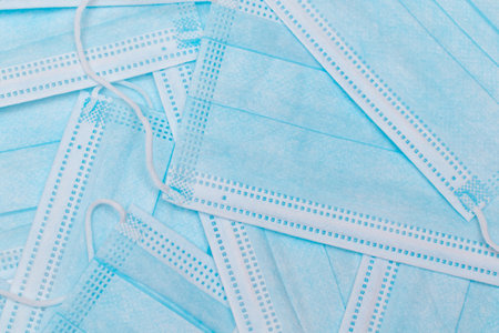 Blue Disposable Medical Face Mask Background. Trade in Medical Masks. Business During a Pandemic or Epidemic.の写真素材