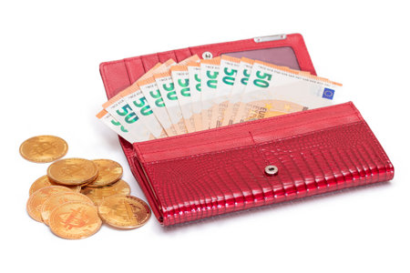 Opened Red Women Purse with 50 Euro Banknotes Inside and Bitcoin Coins - Isolated on White...