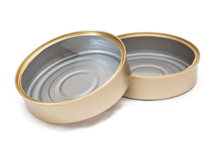 Two Opened Empty Tin Cans Isolated on White Background. Clean Used Aluminum Cans - Isolation. Non-Degradable Inorganic Wasteの写真素材