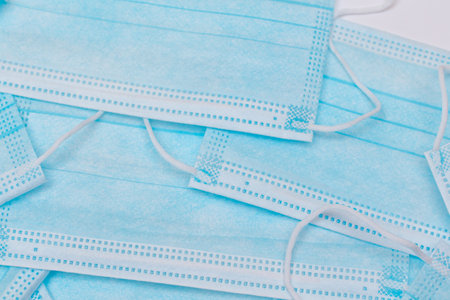 Blue Disposable Medical Face Mask Background. Trade in Medical Masks. Business During a Pandemic or Epidemic.の写真素材