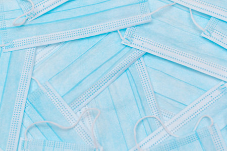Blue Disposable Medical Face Mask Background. Trade in Medical Masks. Business During a Pandemic or Epidemic.の写真素材