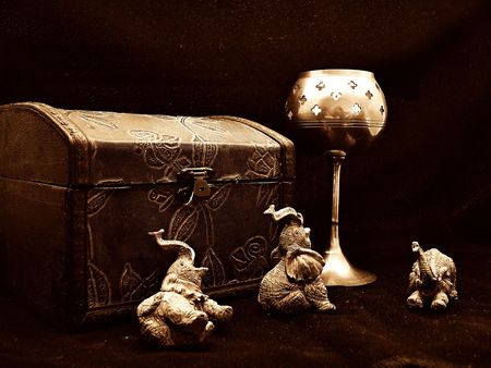 Sepia Scene with Elephants, Candle and Treasure Trunkの写真素材
