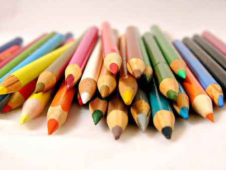 Brightly colored Pencils on a white backdropの写真素材
