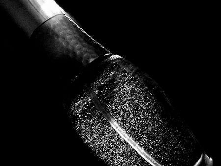 Macro of a perfume bottle with creative lightingの写真素材