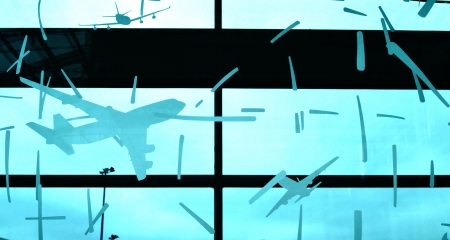 One airport glass wall decoration as aviation promotion の写真素材