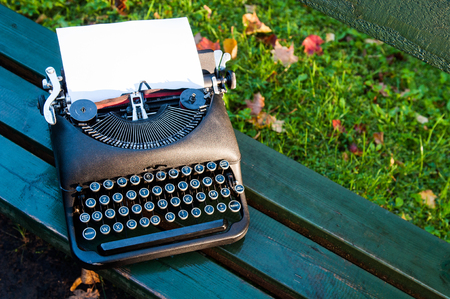 Retro vintage old typewriter close up background on the benchの写真素材