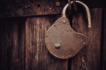 Vintage open Old Lock on the grunge Doorの写真素材