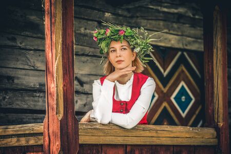 Latvian woman in traditional clothing. Ligo folk.の写真素材