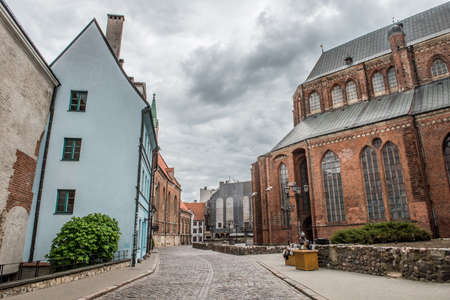 Riga, Latvia - May 21, 2021: Riga old town s street view near St. Peters Church, Latvia