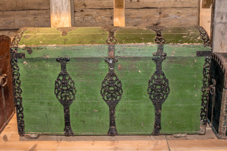 Old wooden chest against wooden wall