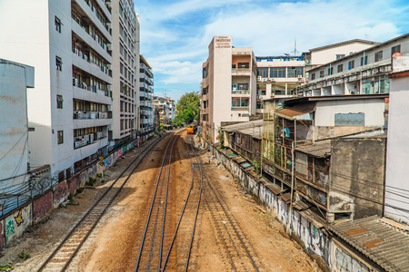 BANGKOK - JANUARY 18, 2017: Bangkok cityscape - district with old buildings, railway at sunshine day on january 18, 2017 in Bangkok, Thailand.のeditorial素材