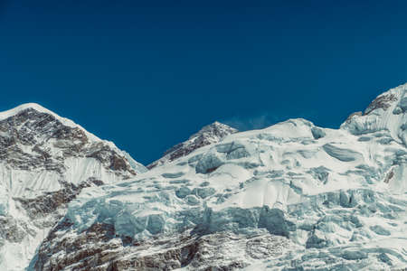 Hiker making selfie at Beautifull Everest and Nuptse mountains landscape from the footpath on the...