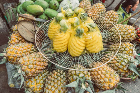 HANOI, VIETNAM - DECEMBER 14, 2018 : Local daily life of the morning street market, street vendors selling various types of fruits and vegetablesのeditorial素材