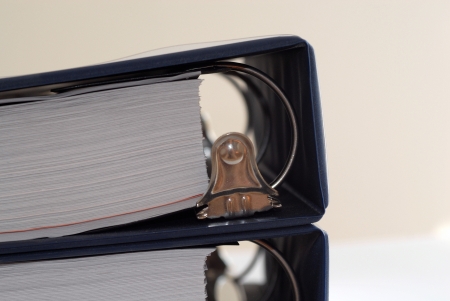 Closeup of blue binder full of paper の写真素材