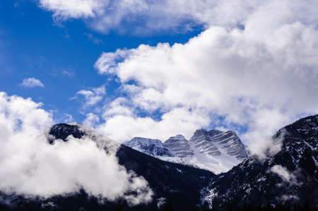Mountain range and forests among clouds and fog in British Columbia, Canada.の写真素材