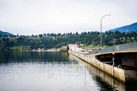 KELOWNA, BC, CANADA - MAY 14, 2019: The William R Bennett Bridge connects downtown Kelowna to West Kelowna across Okanagan Lake.のeditorial素材