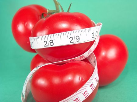 Measuring Tomatoesの写真素材