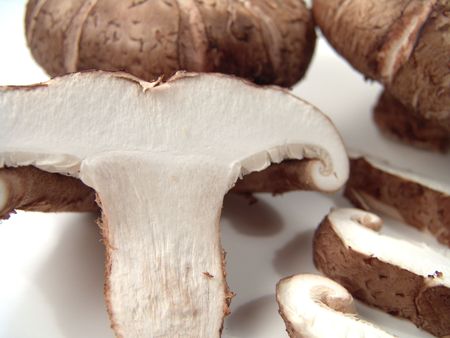 Fresh Asian Mushrooms Close-up with Several Slicesの写真素材