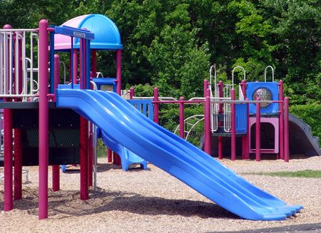 Children’s playground with beautiful slides and exercise setting                               