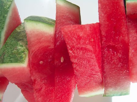 Juicy watermelon pieces stack for summer picnic                               の写真素材