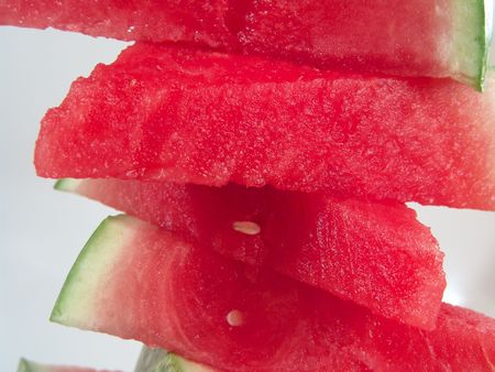 Juicy watermelon pieces stack for summer picnic                               の写真素材