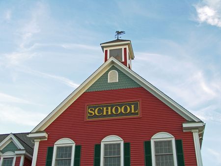 Colonial House School Building Against Blue Sky                          の写真素材