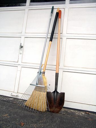 Broom, shovel and leave rake gardening and cleaning toolの写真素材