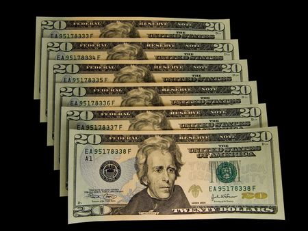 Isolated banknotes with serial numbers in ascending orderの写真素材