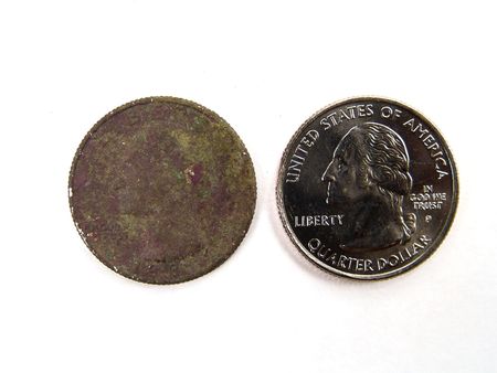 A rusty and a new United States quarter dollar macro close-up                               